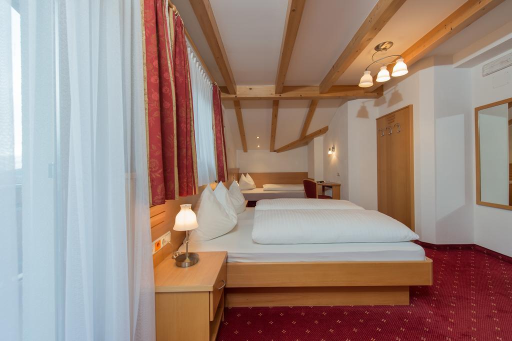 Hotel Garni Hochgruber Бруніко Номер фото